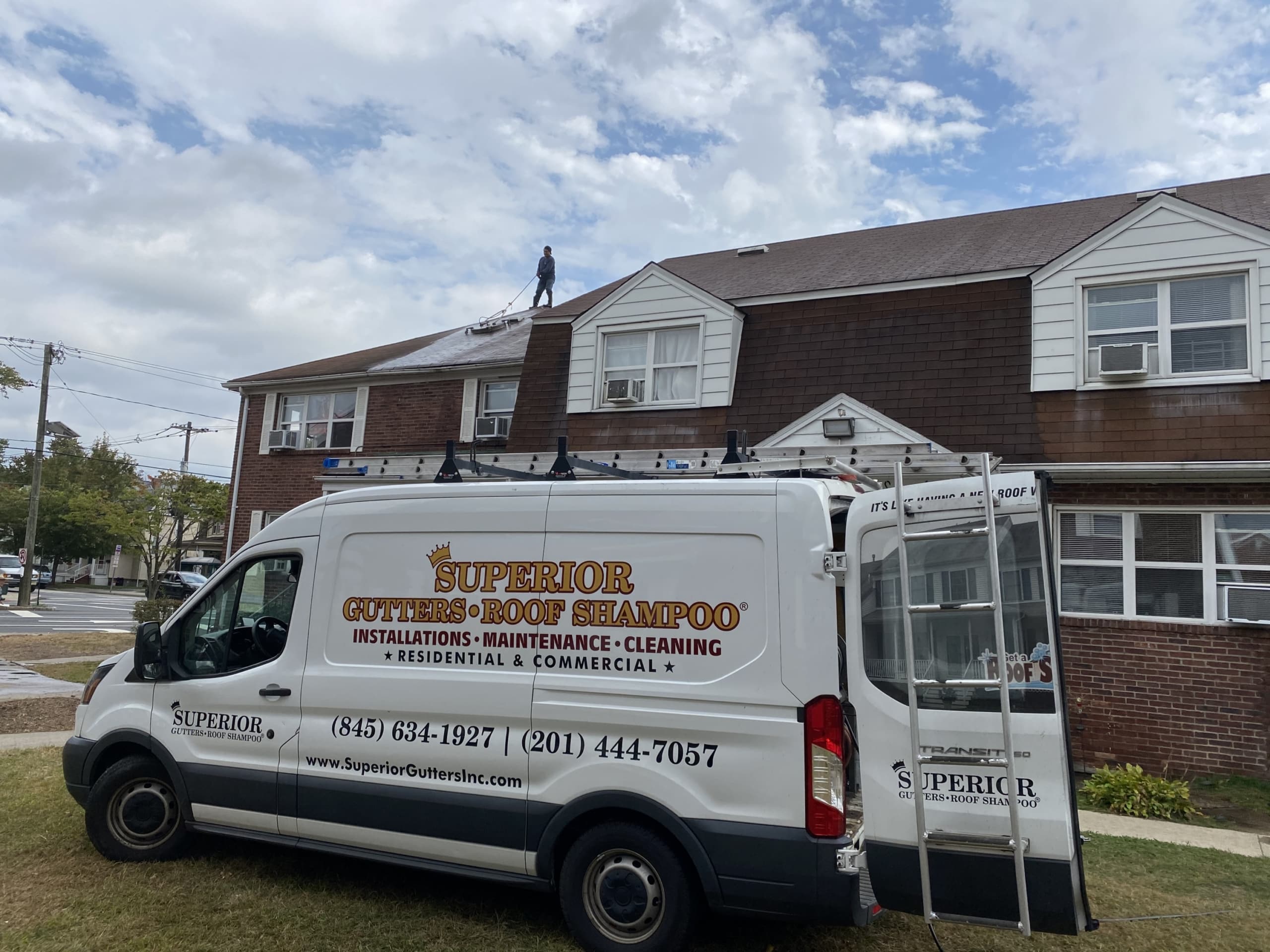 roof cleaning of apartment complex in bergen county nj by superior seamless gutters